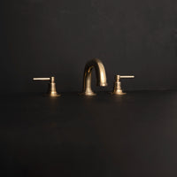 Widespread sink faucet