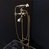 Unlacquered Brass Floor Mount Bath Tub Filler, Brass Bathroom Free Standing Clawfoot Bathtub Faucet With Telephone Hand Shower Unlacquered Brass Floor Mount Bath Tub Filler