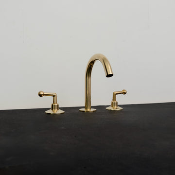 The Golden Arch: A Modern Brass Bathroom Faucet