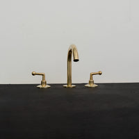 The Golden Arch: A Modern Brass Bathroom Faucet