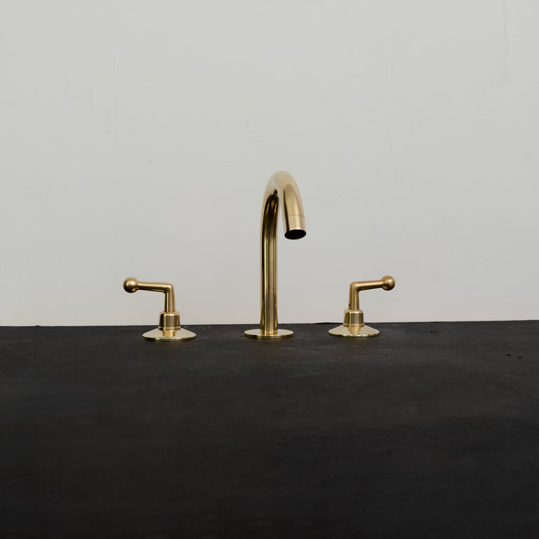The Golden Arch: A Modern Brass Bathroom Faucet