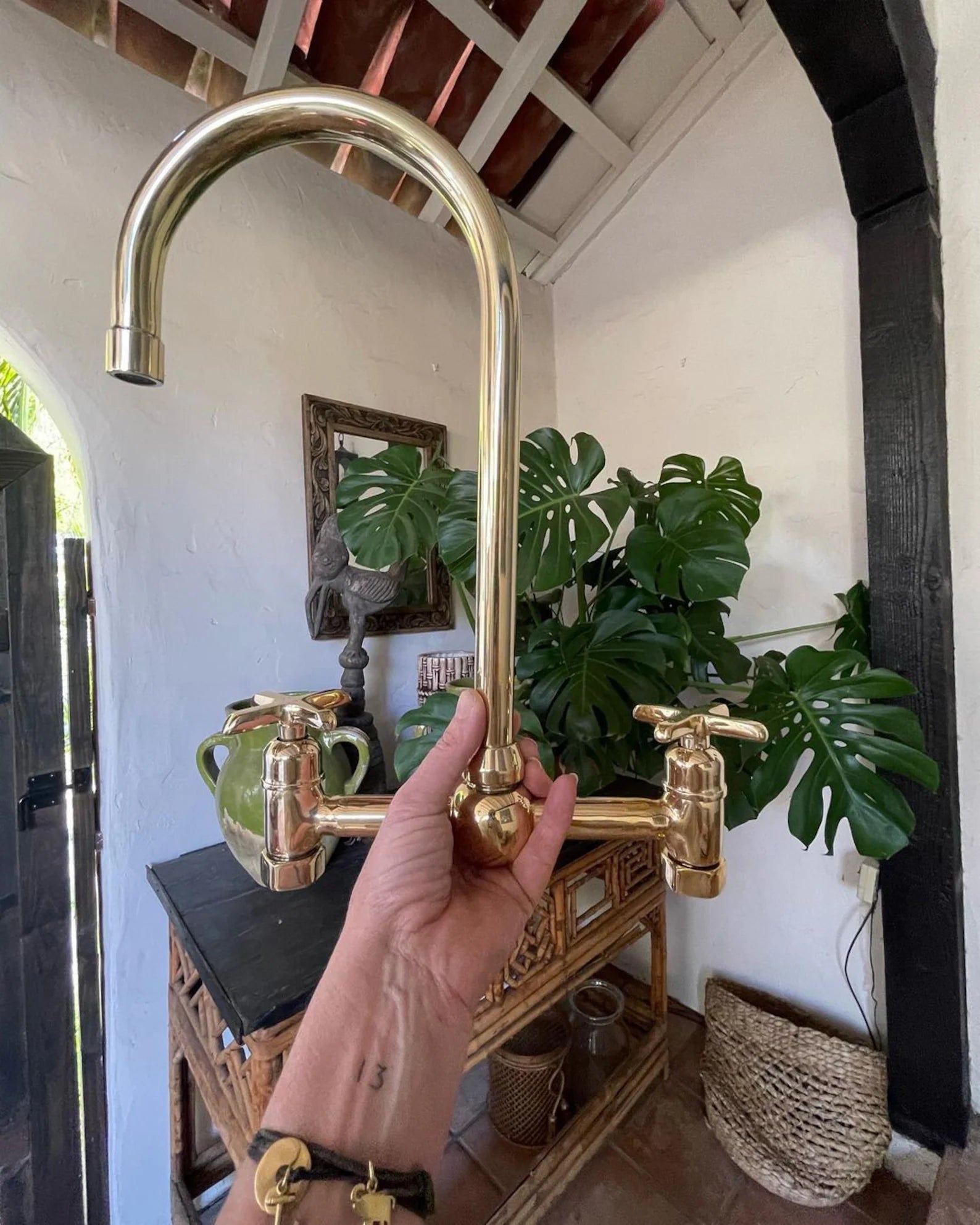 Unlacquered Brass Bridge Kitchen Faucet with Metal Lever Handles Front View