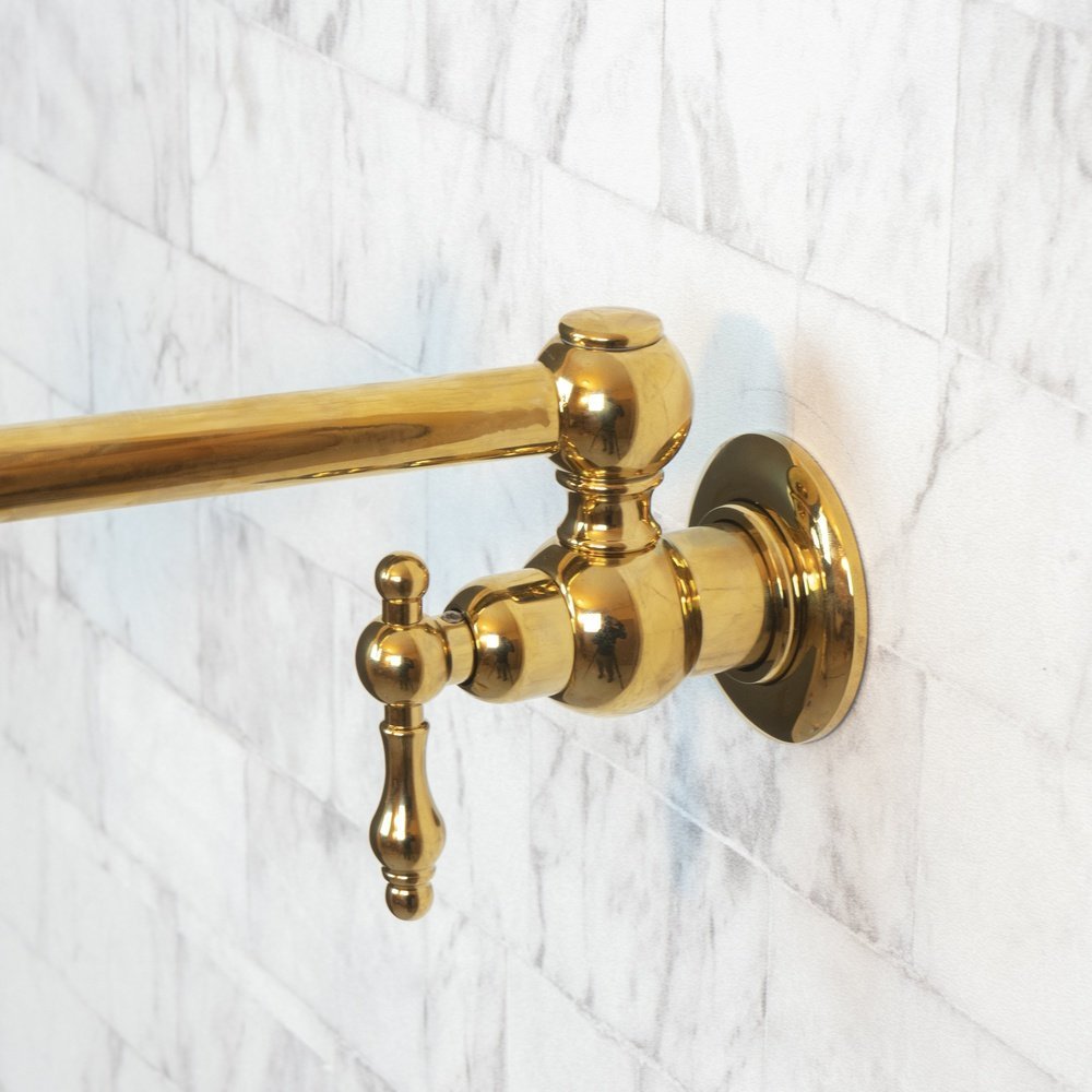 Gold Kitchen Pot Filler Faucet Folded Against Backsplash