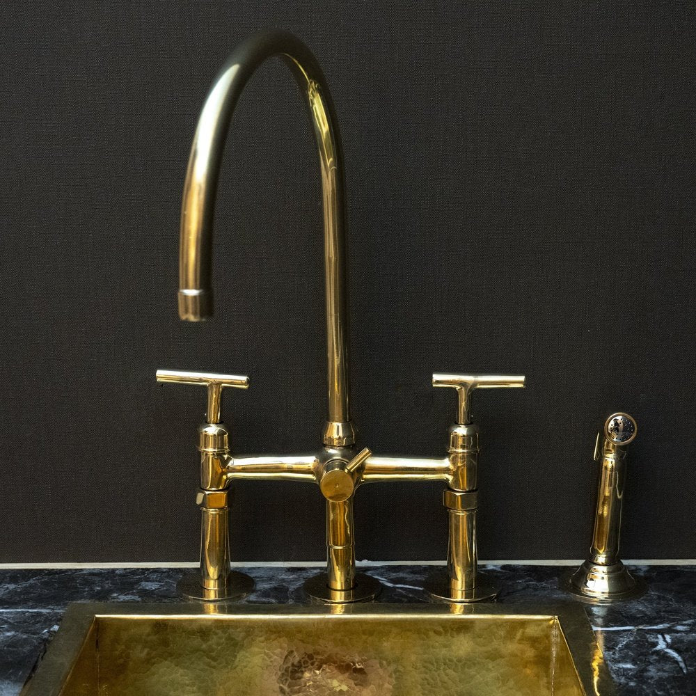https://www.brassna.com/cdn/shop/products/unlacquered-brass-3-holes-kitchen-bridge-faucet-232705_1100x.jpg?v=1705538066