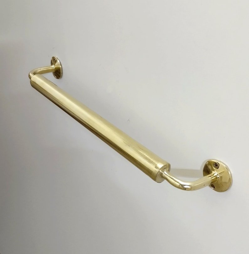  Unlacquered brass towel bar